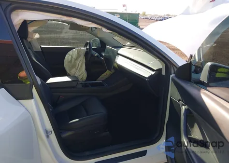 2022 Tesla Model Y from USA, damaged, VIN 7SAYGDEF6NF409540